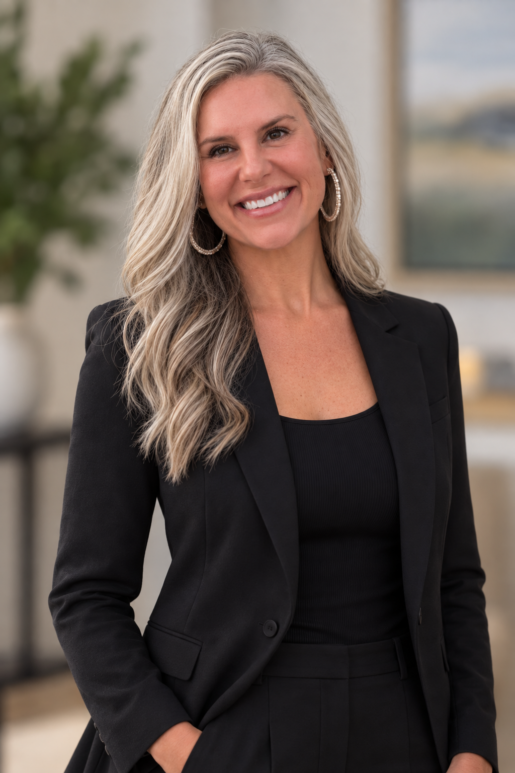Stephanie Sutton, founder and search partner at Bridge Partners of Texas, wearing a black blazer